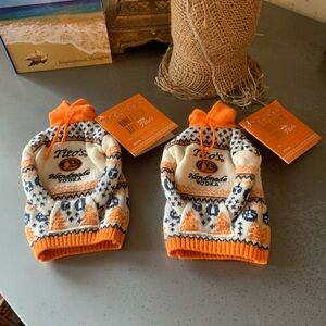 2 TITO’S NEW WITH TAG’S handmade vodka bottle covers, UGLY BOTTLE SWEATER’S.